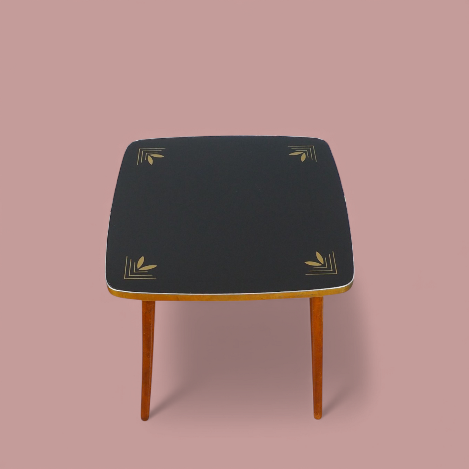 Stolik Alburette Busch widok z góry, czarny blat ze złotym botanicznym wzorem liści, German design